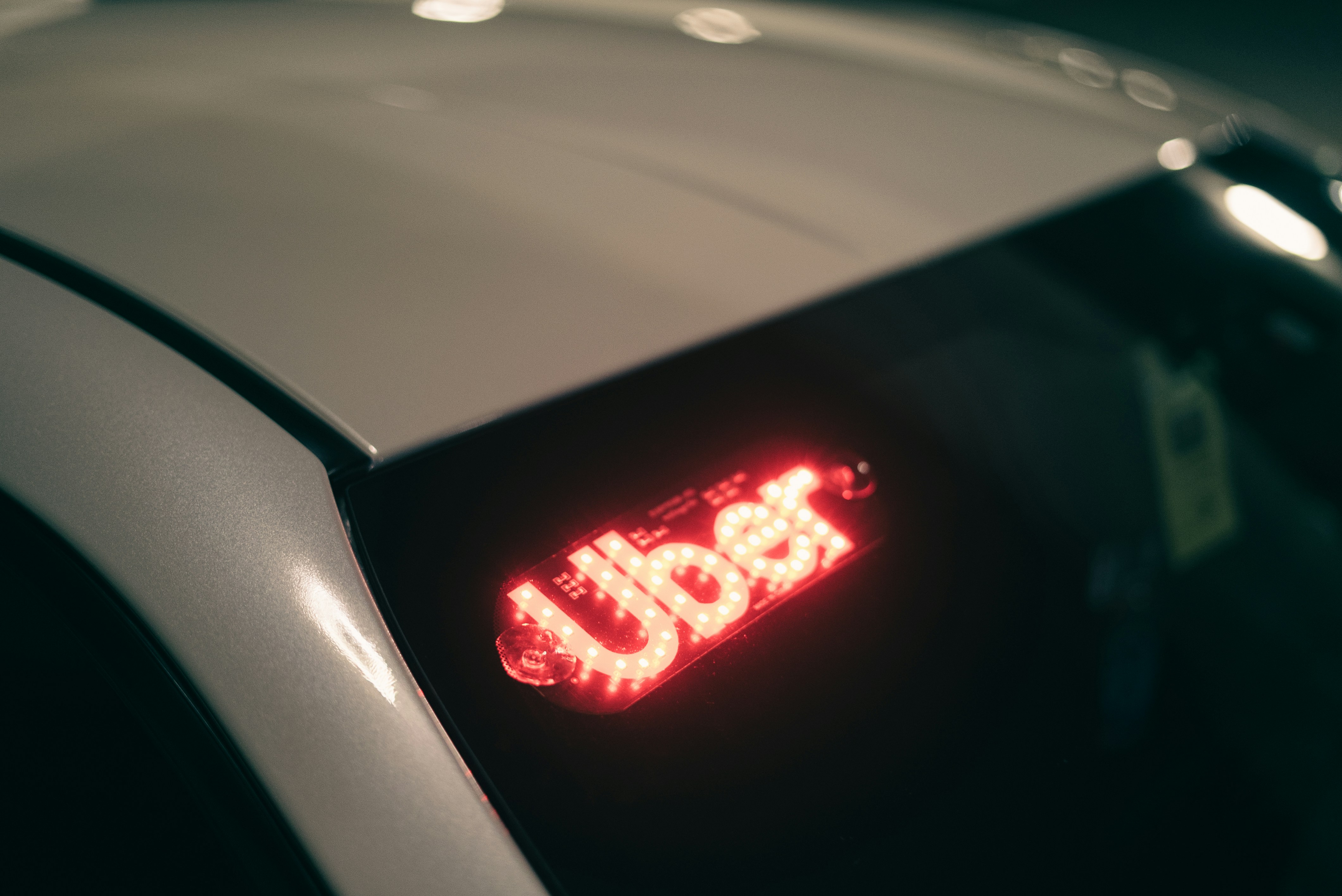 Uber illuminated sign on car - Uber accident legal defense New Jersey