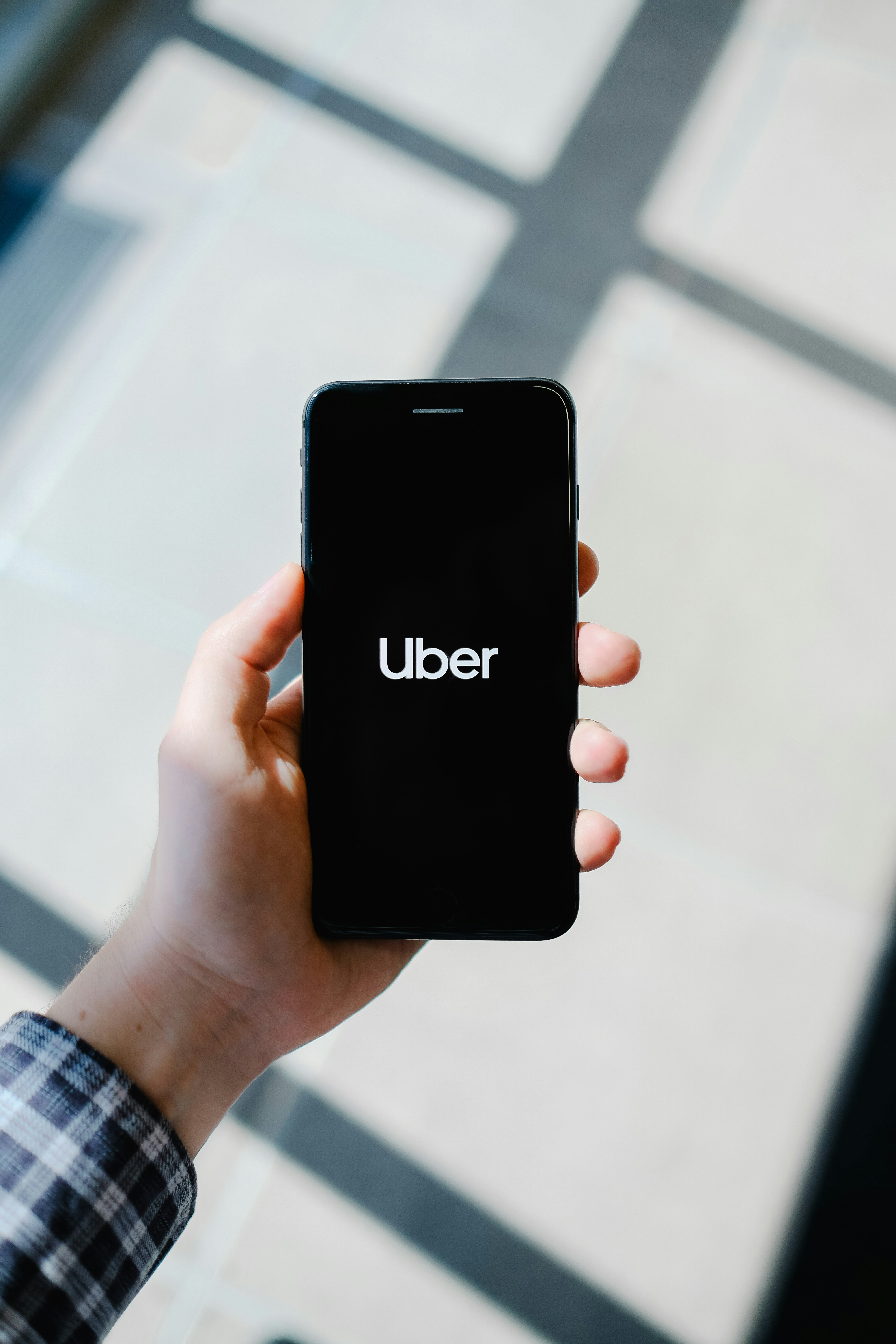 Attorney reviewing Uber accident defense case files in New Jersey